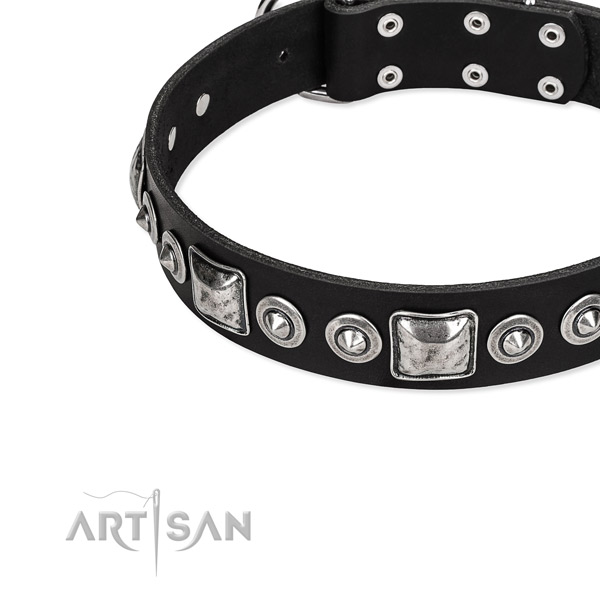 Genuine leather dog collar made of soft to touch material with adornments