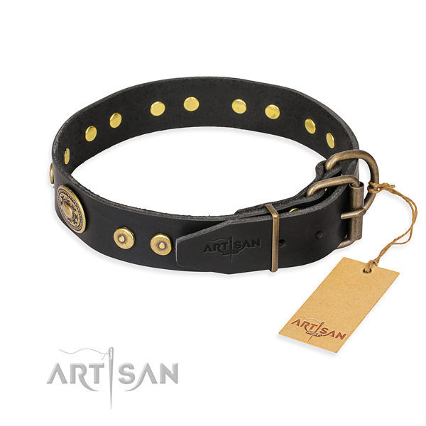 Genuine leather dog collar made of gentle to touch material with rust-proof adornments