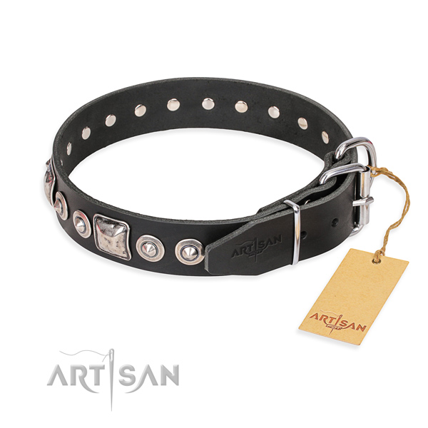 Full grain natural leather dog collar made of gentle to touch material with reliable studs