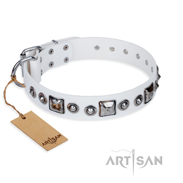 Leather dog collar made of gentle to touch material with strong hardware